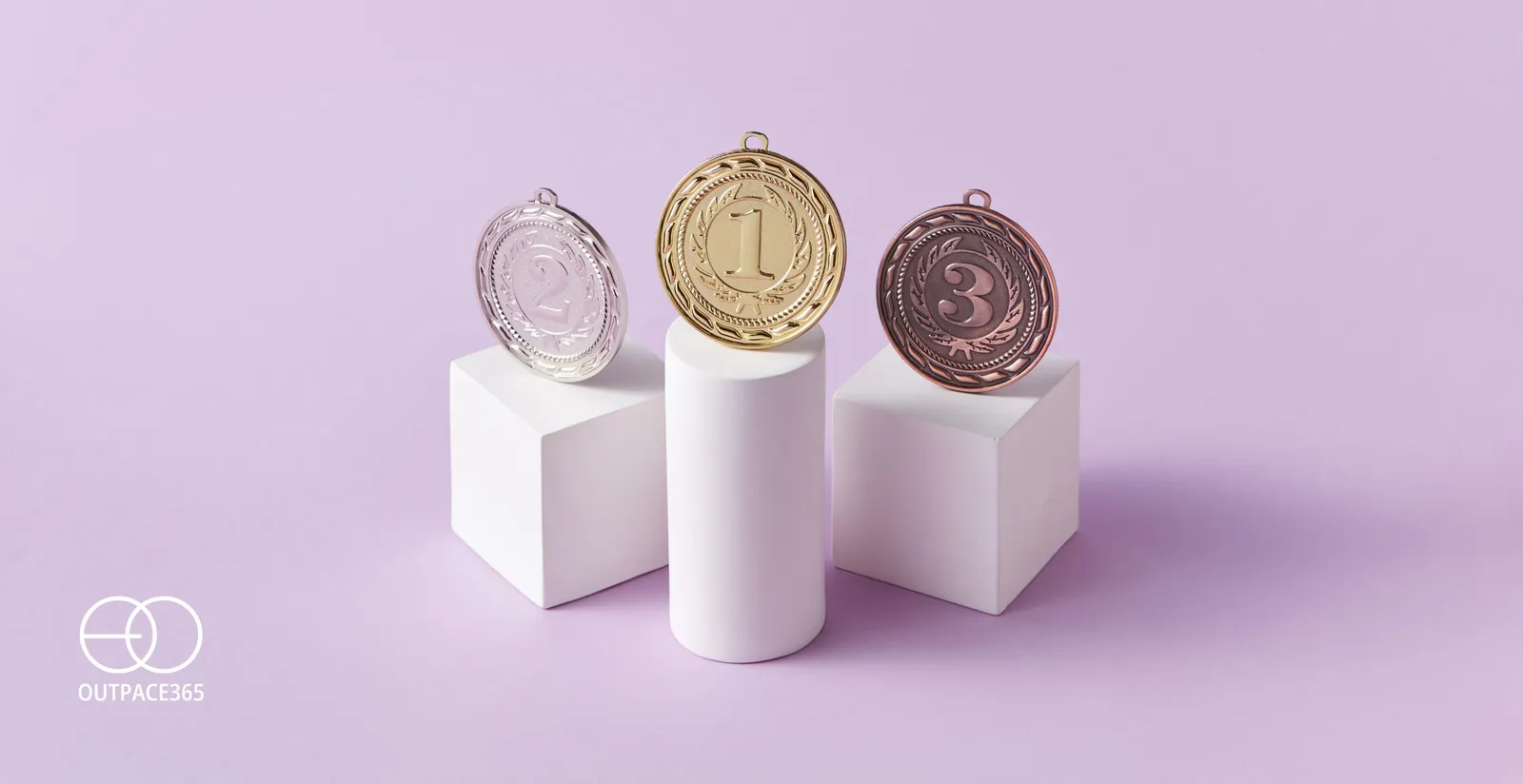 Gold, silver and bronze medals on podium blocks