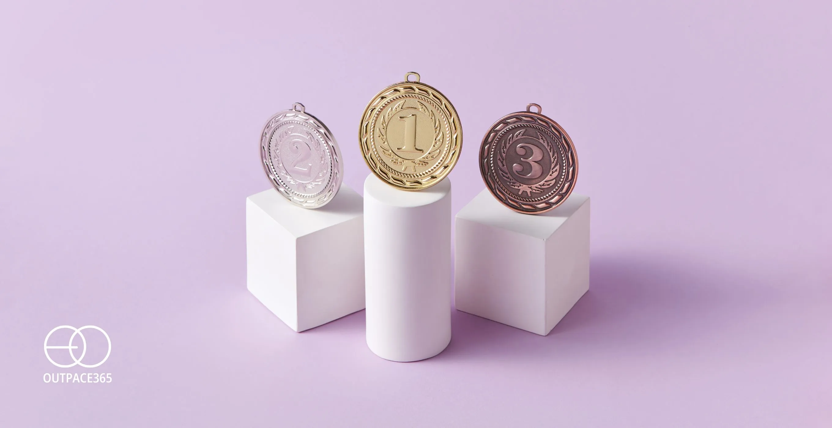 Gold, silver and bronze medals on podium blocks